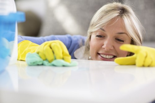 Carpet cleaning team maintaining safe and tidy working conditions