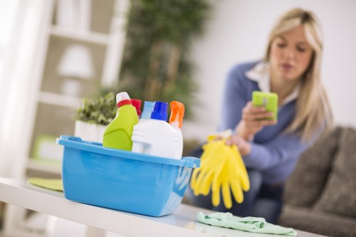Lewisham carpet cleaners using PPE while cleaning a carpet